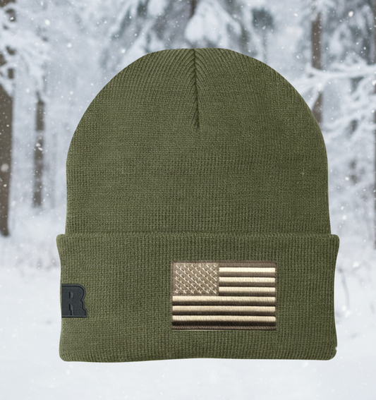 Green beanie with American flag patch on a white background