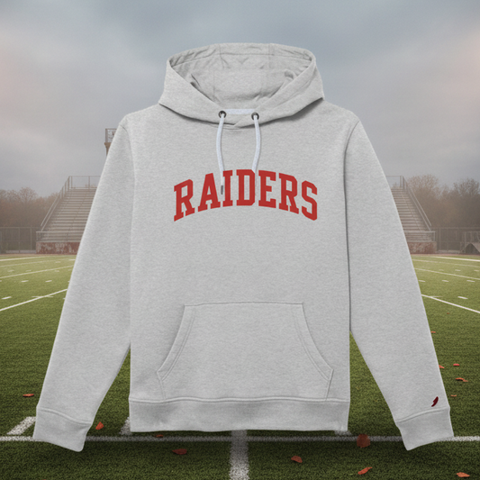 A light heather gray pullover hoodie with 'RAIDERS' printed in red arched block letters across the chest, featuring a front kangaroo pocket and white drawstrings, shown on a plain white background.